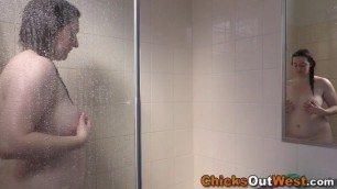 Aussie showers and fingers her pussy