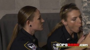 Big titty MILFs are taking turns to suck and play with a big black dick in jail.