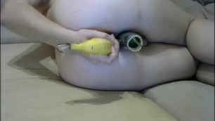 Horny blonde is using banana and cucumber for her both holes