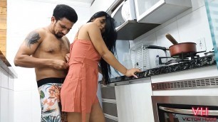 My uncle punching his girlfriend's pussy in the kitchen